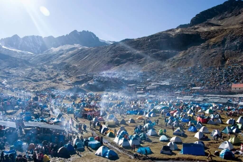 Discover the Magic of the Qoyllur Riti Festival Pilgrims Camping Sinakara Valley